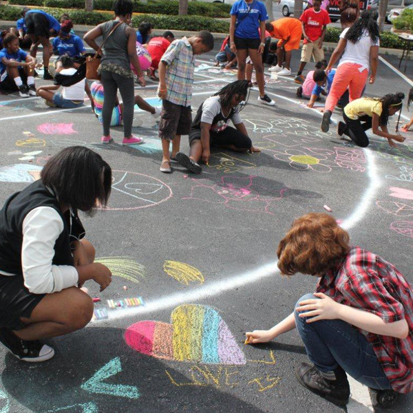 1%20Booville%20Pumpkin%20Carving%20Contest%20Judge%20Jacklyn%20Laflamme%20Pembroke%20Pines squashed